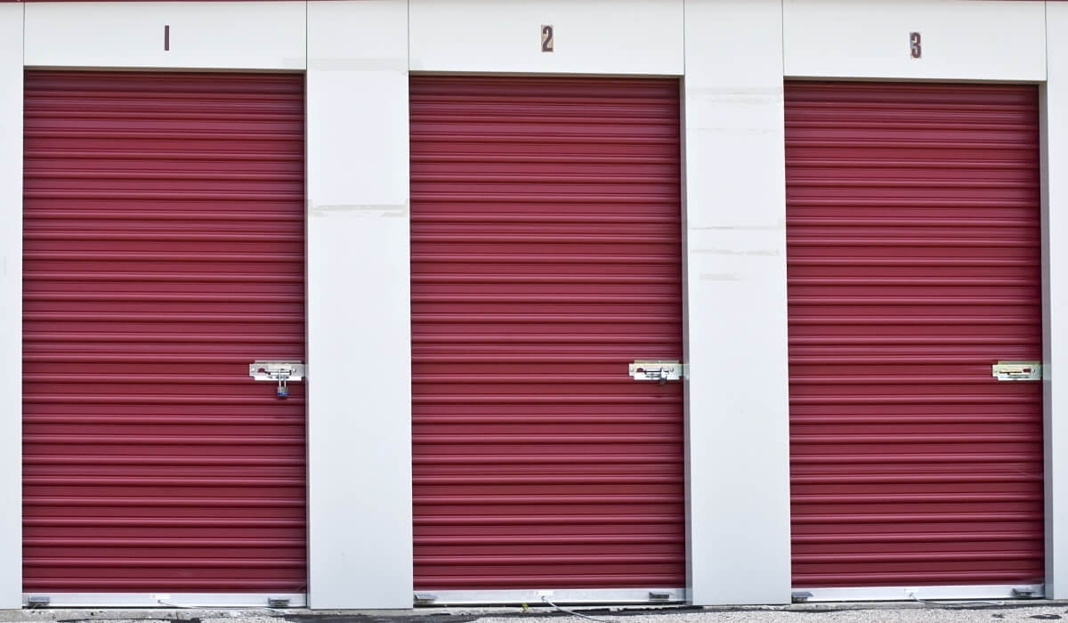 Red storage unit doors at Forest Creek Mini Storage